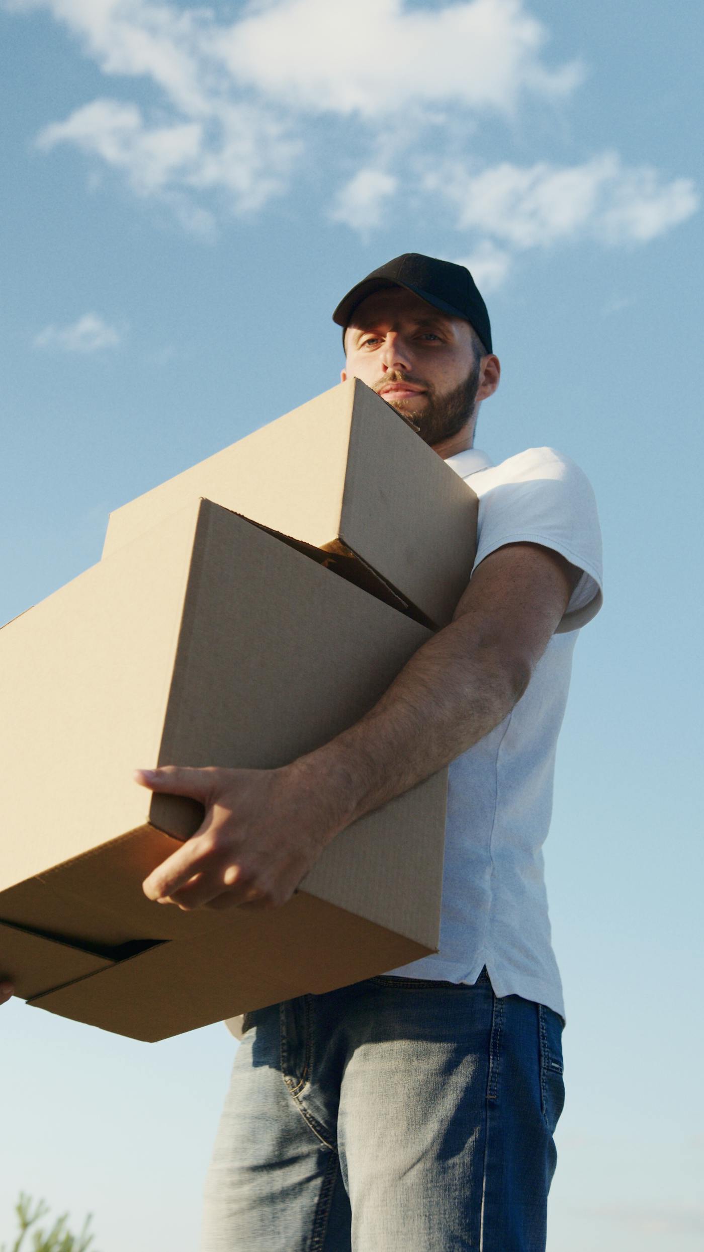 Hanley Moving Company moving truck and crew on a job in Capital Region
